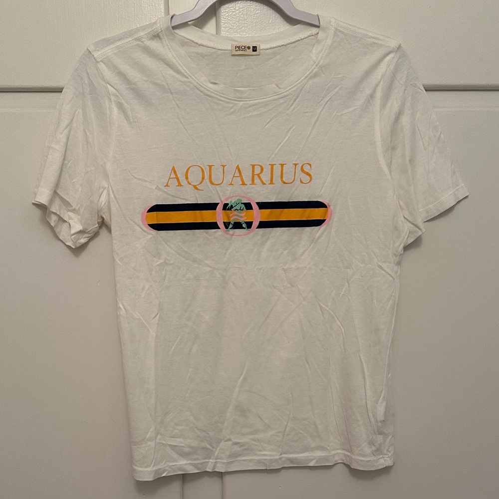LIKE NEW Piece Apparel Aquarius White Short Sleeve Graphic Tshirt